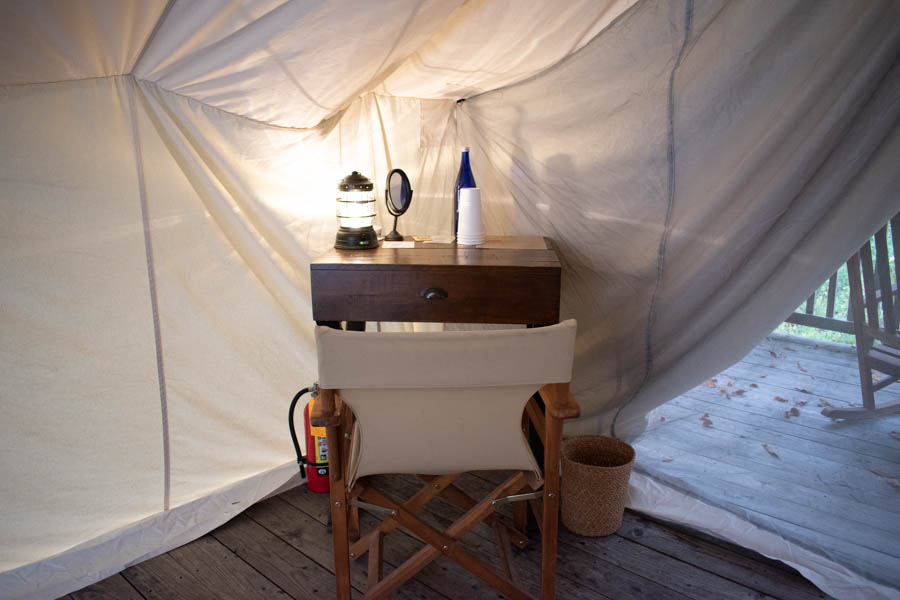 Desk in tent at Firelight Camps in New York