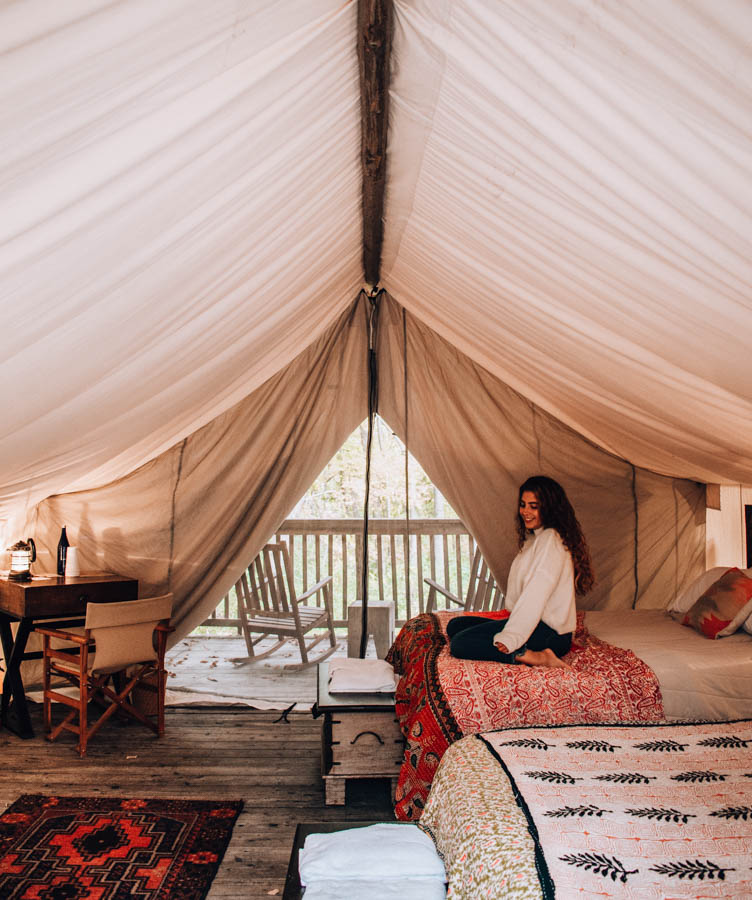 Anna Hammerschmidt in tent at Firelight Camps in Ithaca