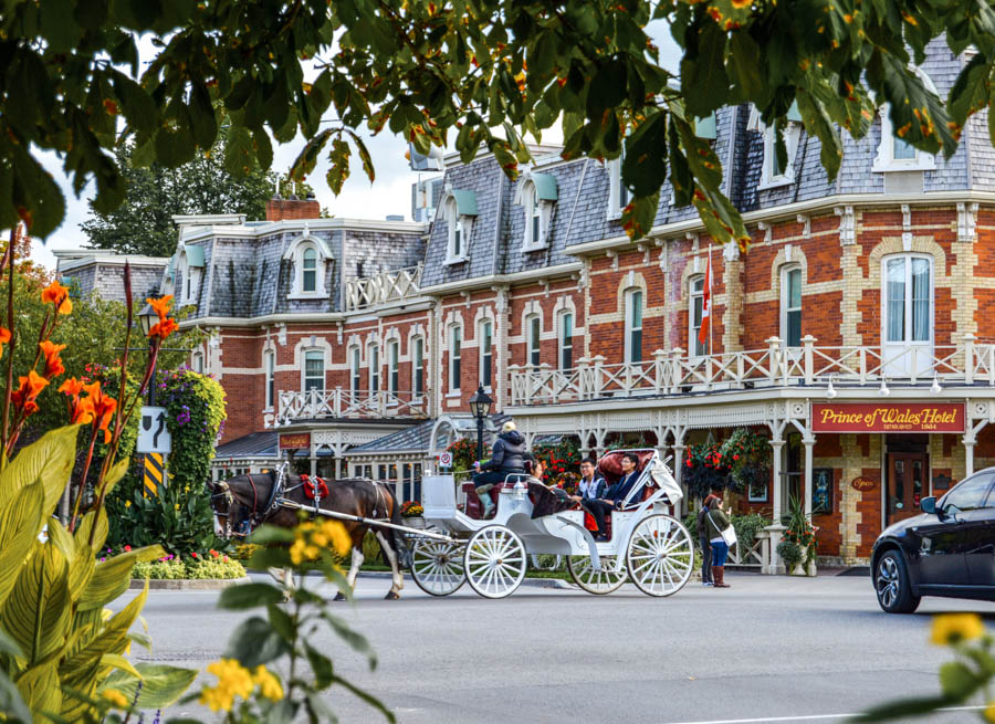 Niagara-on-the-Lake hotel with trees framing photo 