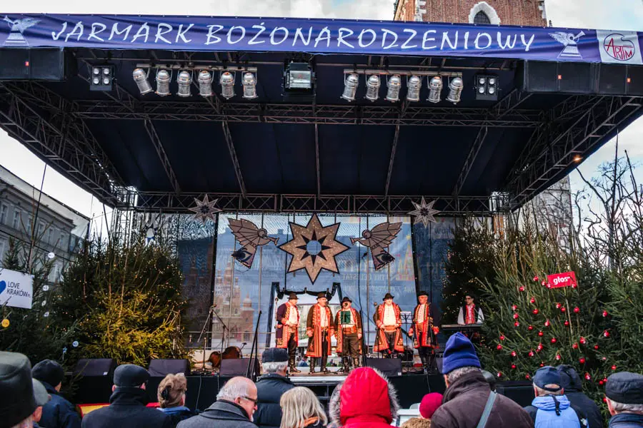 carolers on stage at the Krakow Christmas Market