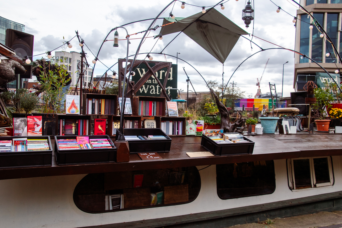 Outdoor book display on the deck of Word on the Water, London’s iconic floating bookstore moored on Regent’s Canal near King’s Cross.