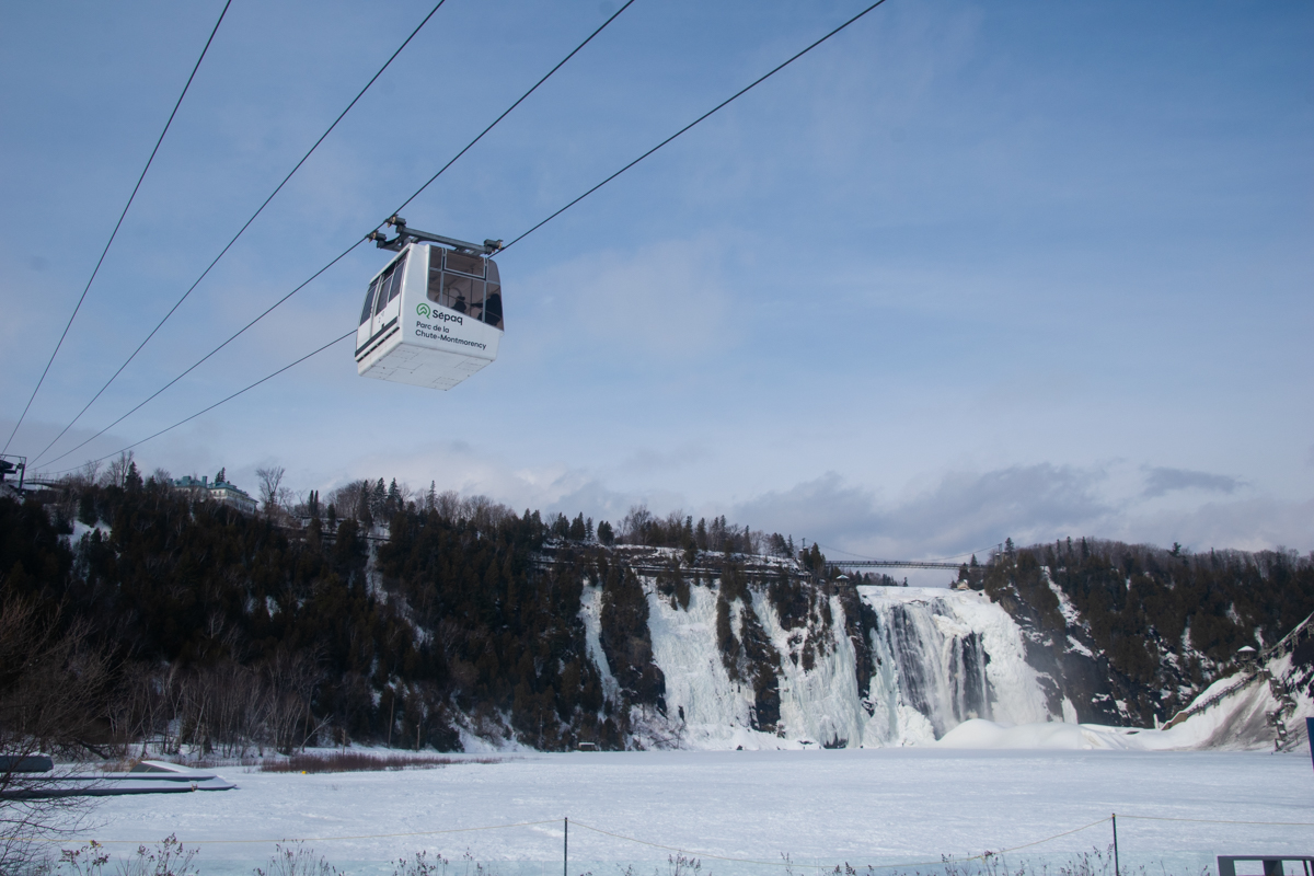 Cable car over frozen Montmorency Falls near Quebec City in winter