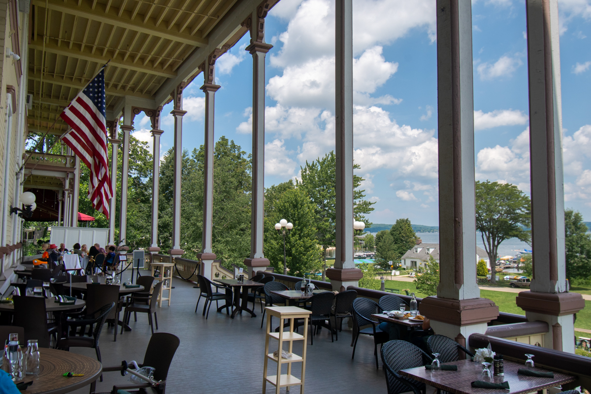 Wraparound porch at the Athenaeum Hotel overlooking Chautauqua Lake at Chautauqua Institution, New York.