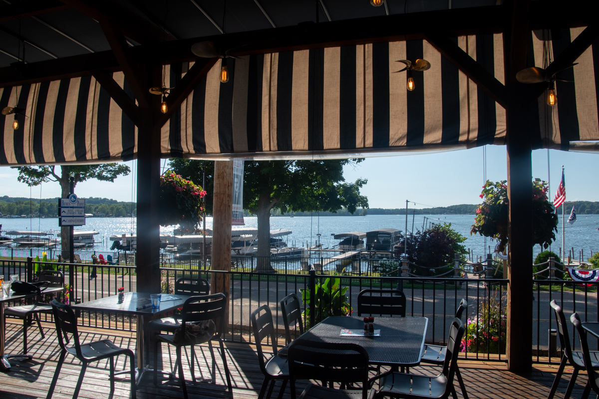 Outdoor patio overlooking Chautauqua Lake at Ellicottville Brewing on Chautauqua in Bemus Point, New York.