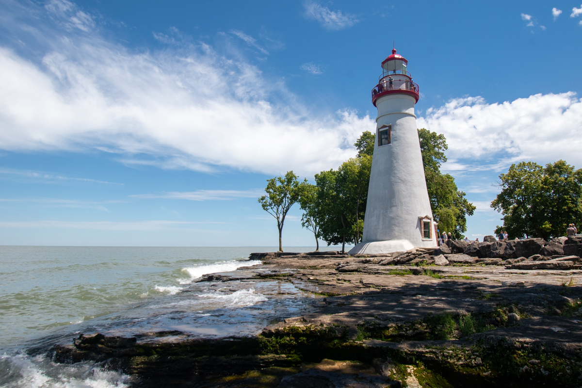 Marblehead Lighthouse overlooking the rocky Lake Erie shoreline in Marblehead, Ohio.