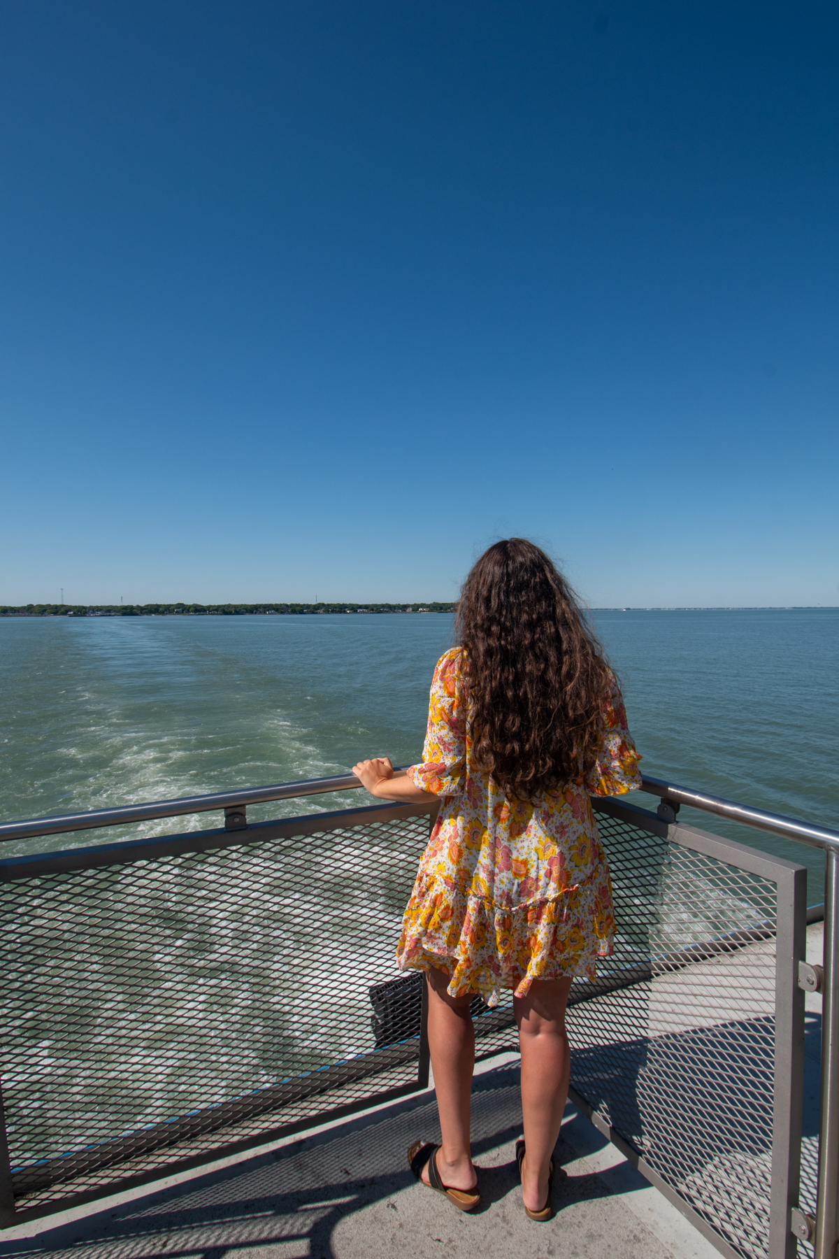 Woman taking in the views from the Miller Ferry crossing Lake Erie to Put-in-Bay.
