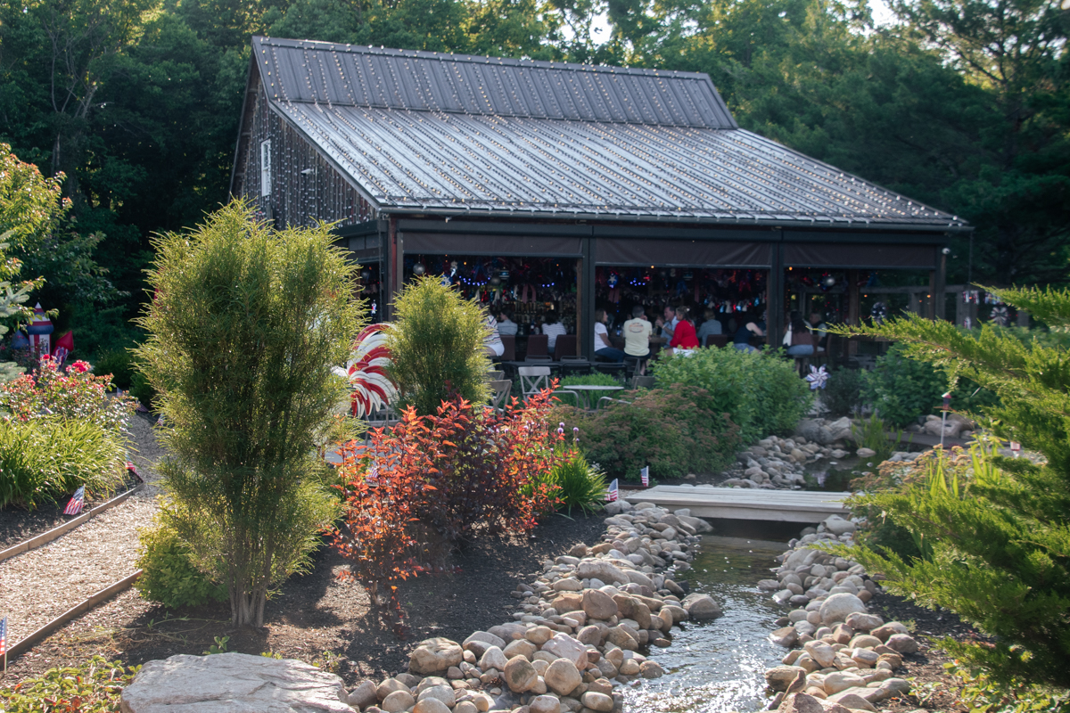 Outdoor patio and garden at The Orchard Farm Stand in Lake Erie Shores & Islands, Ohio.